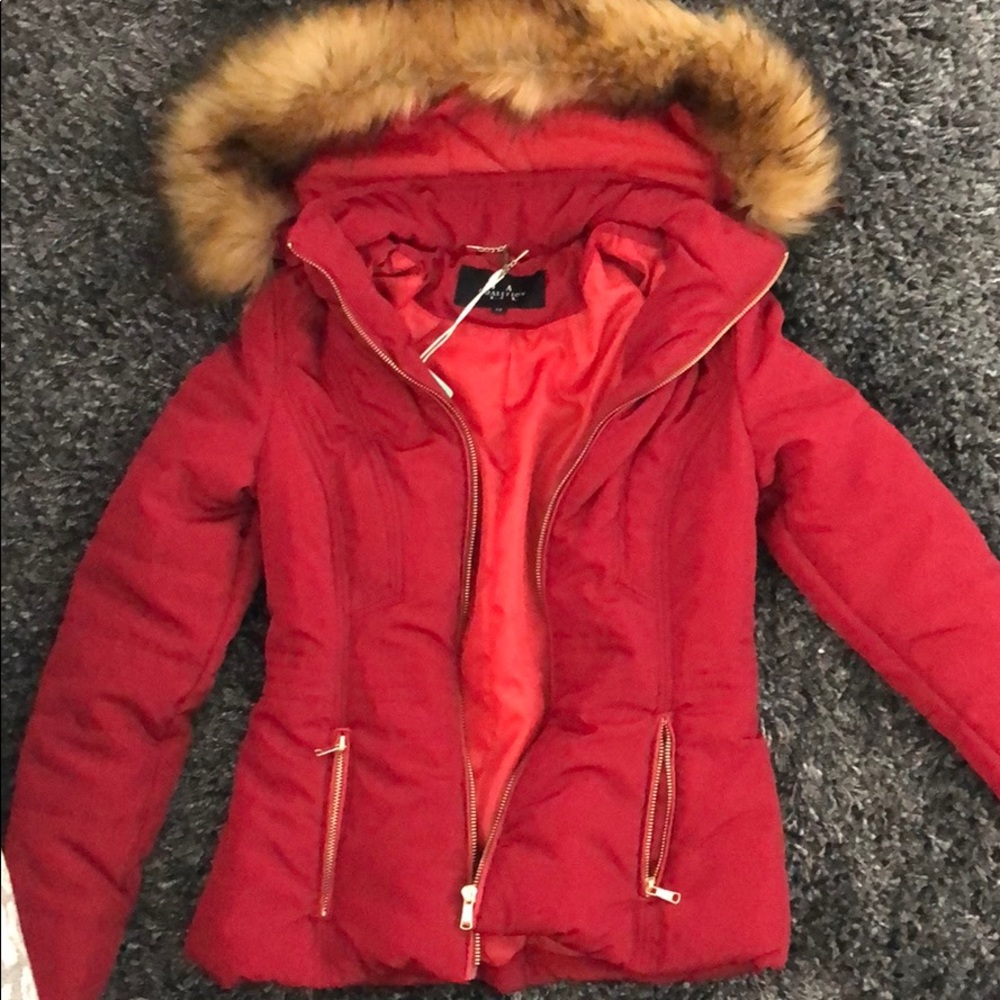 Red puffer jacket with faux fur hood